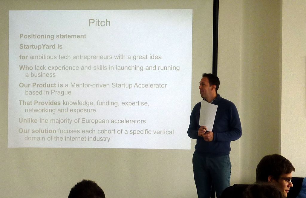 Vasek Formanek giving an early version of is pitch, with the StartupYard positioning statement as a guide. 